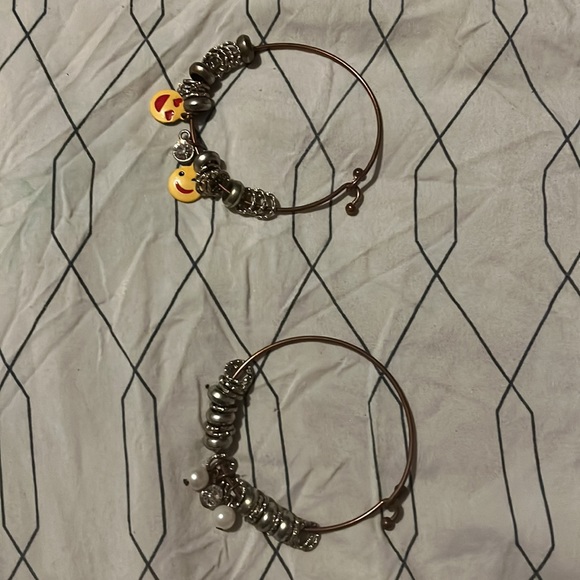 These are two lightly used bracelets. They come with beads that can be removed. - Picture 2 of 2